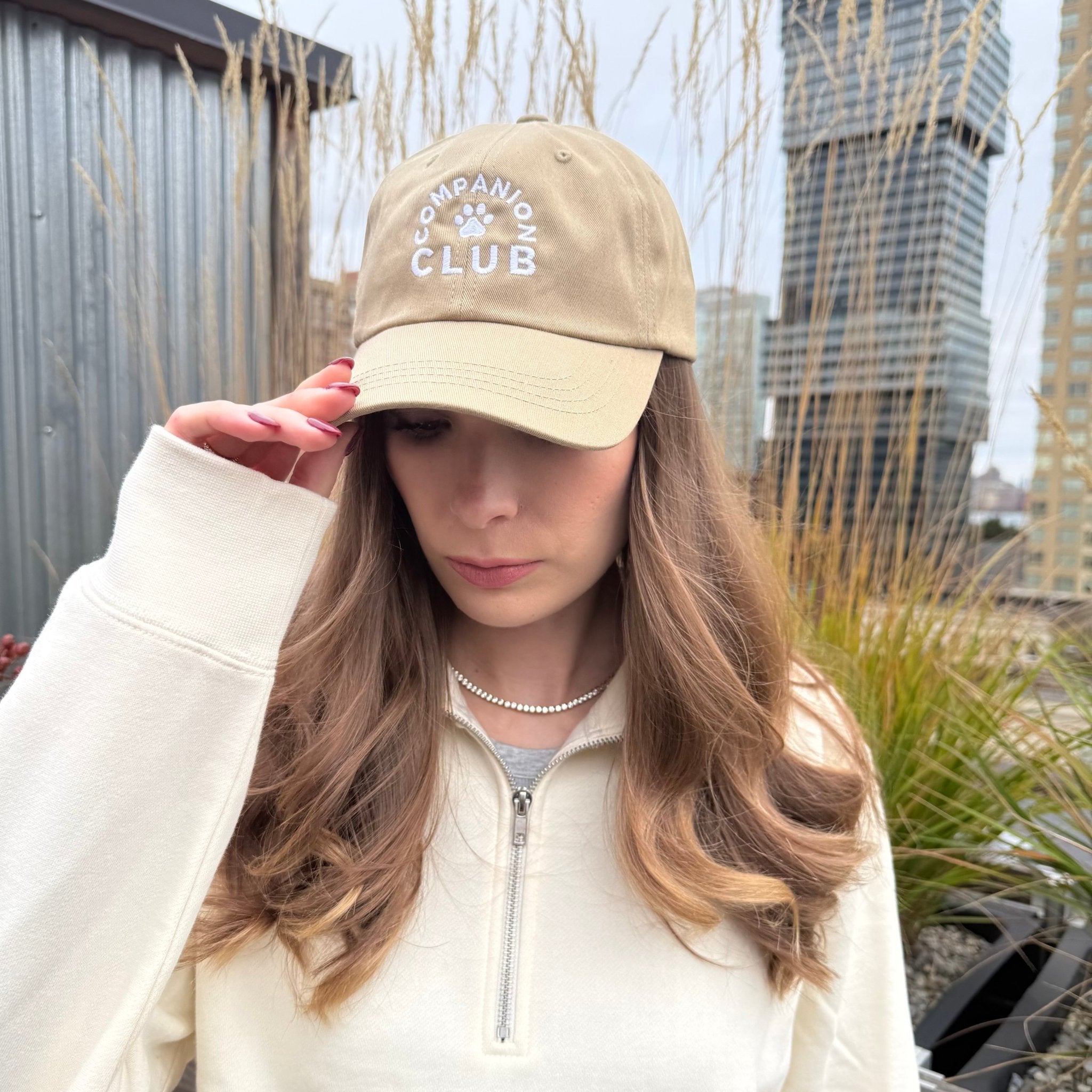 Tan Companion Club Hat worn by a brunette girl